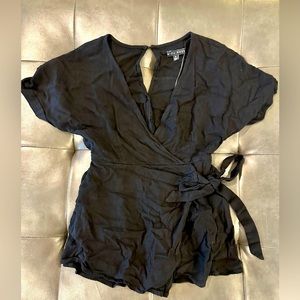 Black skirted romper